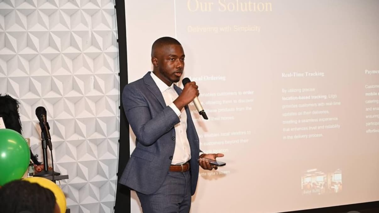 Manken Conde speaking at a conference